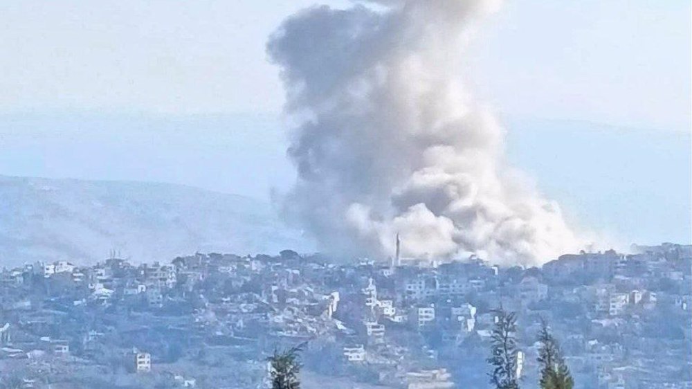 Israeli forces detonating buildings in the eastern parts of the city of Khiam, southern Lebanon.